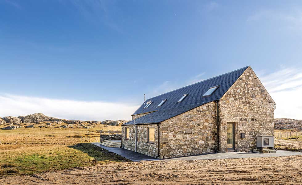 air-source heat pump on a stone cottage renovation