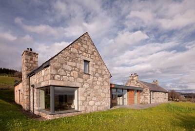 stone home in the highlands with glazed timber link
