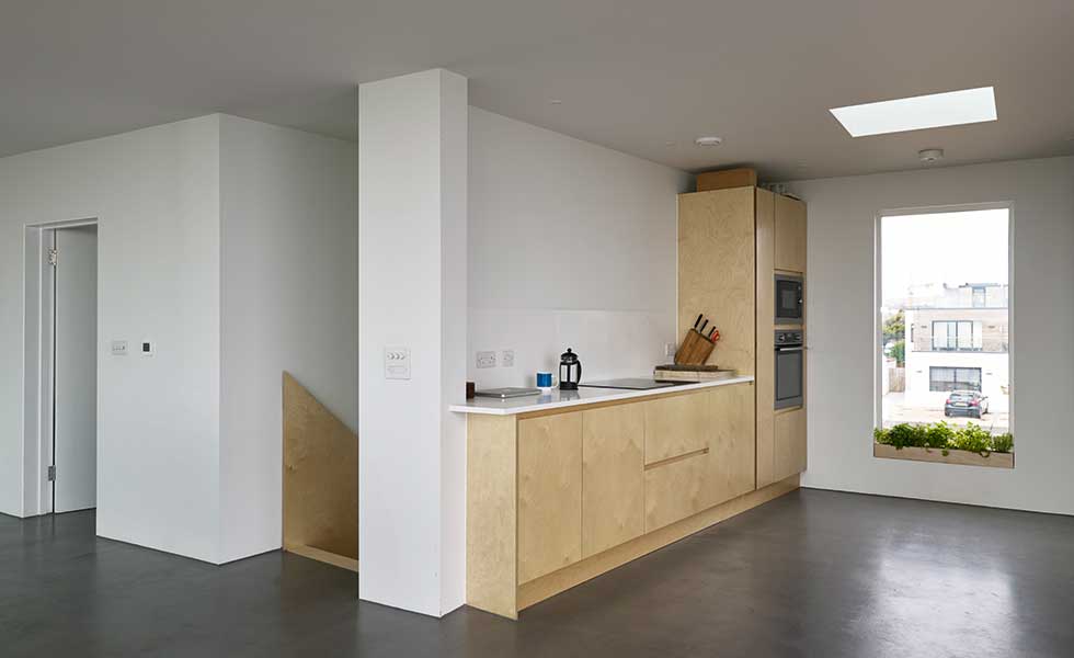 Close-up-of-the-kitchen-and-adjacent-staircase