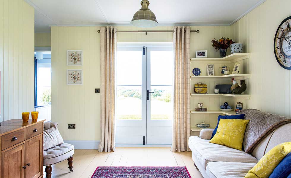 Living-space-with-timber-clad-walls-and-built-in-storage