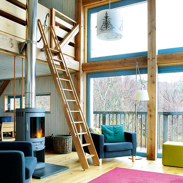 Double-height-living-room-with-large-areas-of-glazing
