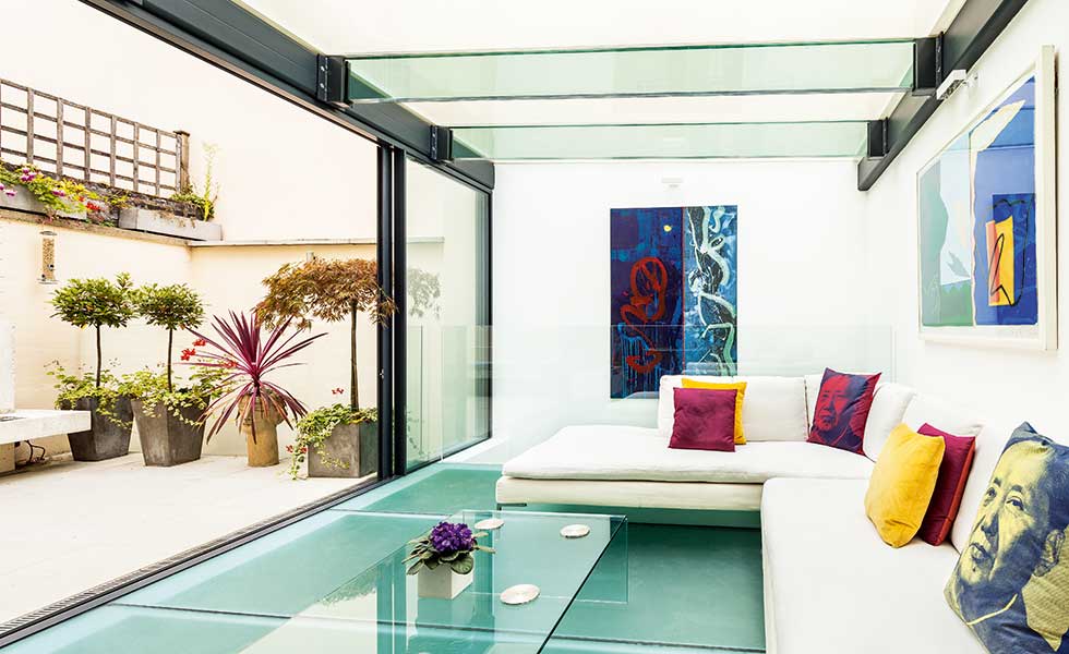 glass basement extension to a Grade II-Listed mews home