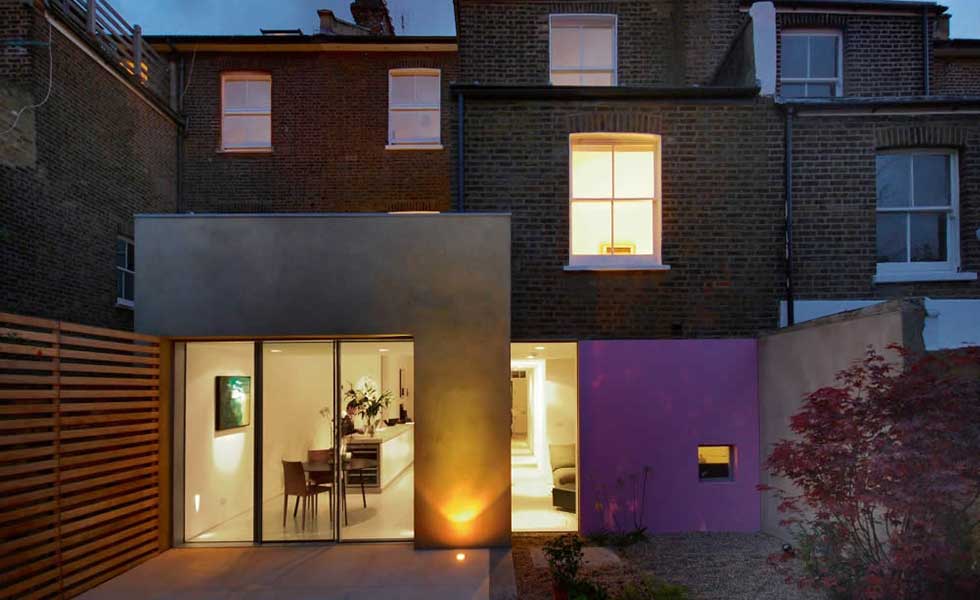 vibrant and modern pink concrete extension to Victorian terrace