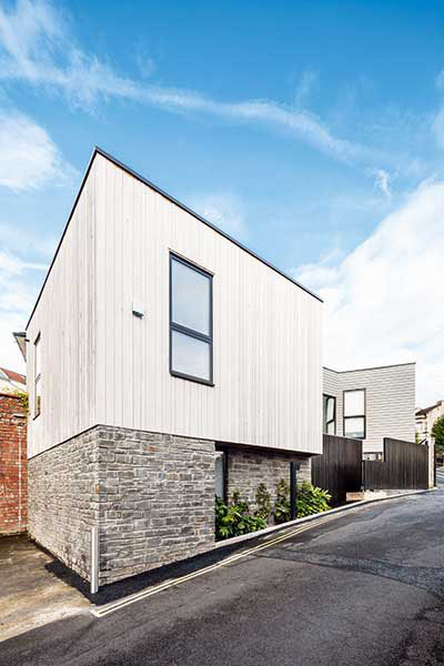 exterior of a timber clad self build on a brownfield plot