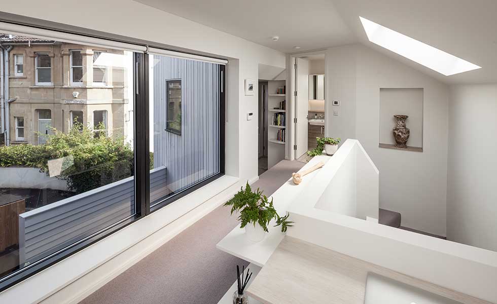 contemporary self build landing with picture windows