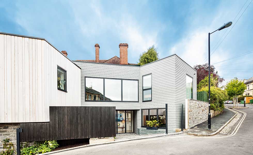 timber clad self build on corner plot