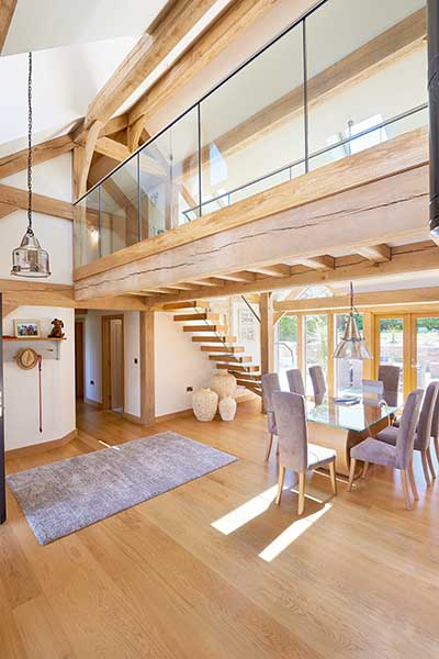 Open plan dining space with oak French doors