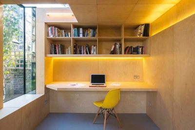 Layered LED lighting illuminates this garden home office