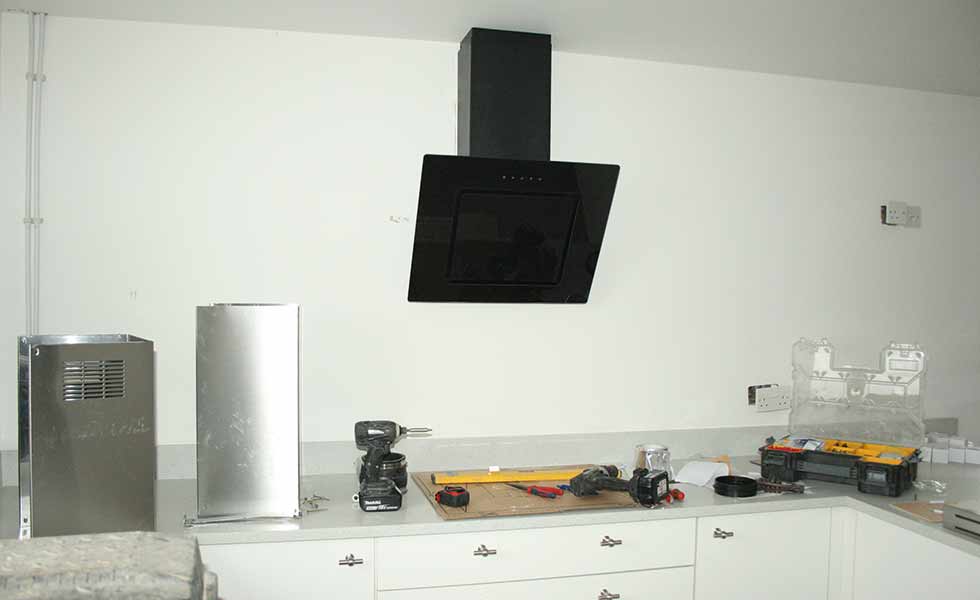 The cooker hood is fitted during the fixtures and fittings stage of David Snell's self build