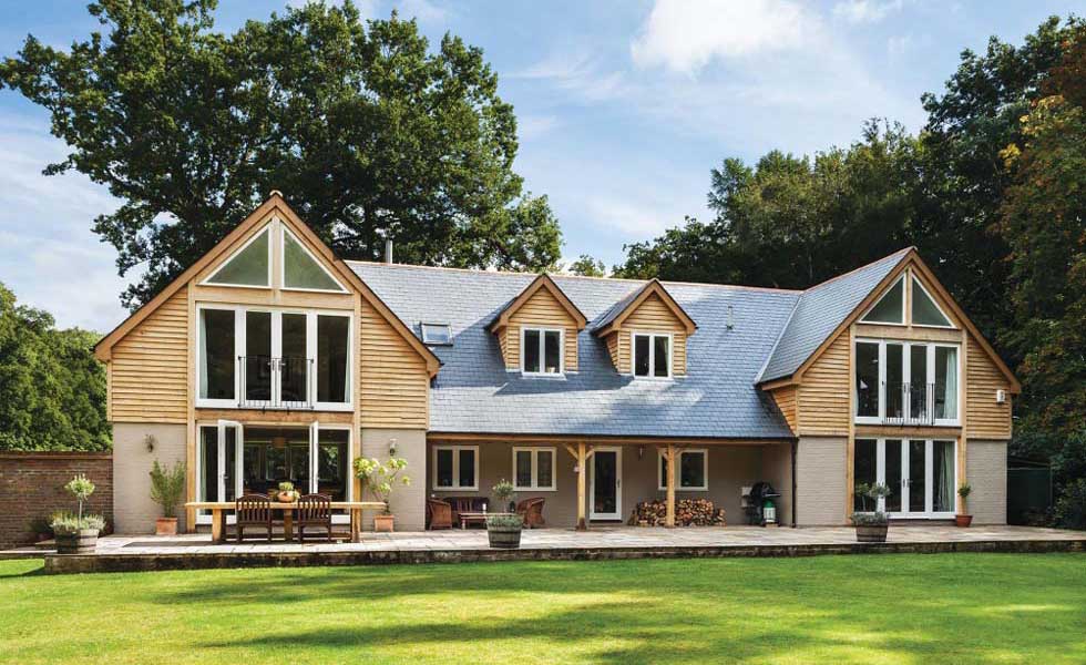 rear view of a bungalow with a converted loft