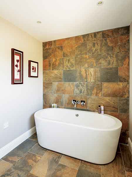 The tiles in this package self build were sourced from The Tile Gallery and fitted by the homeowners themselves to save on costs
