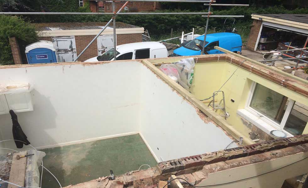 removing a flat roof
