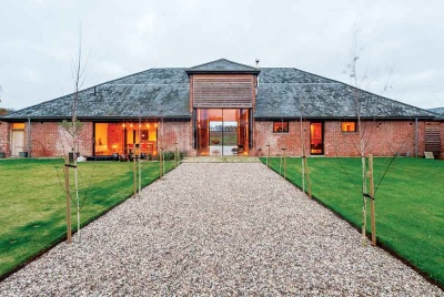Exterior of brick and timber barn on Essex/Suffolk border
