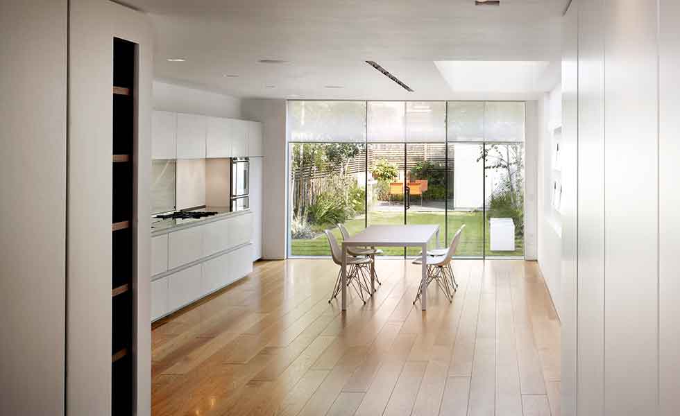 A fully open plan ground floor arrangement has been made possible thanks to this extension and remodel scheme of a London terrace by Thompson + Baroni Architects