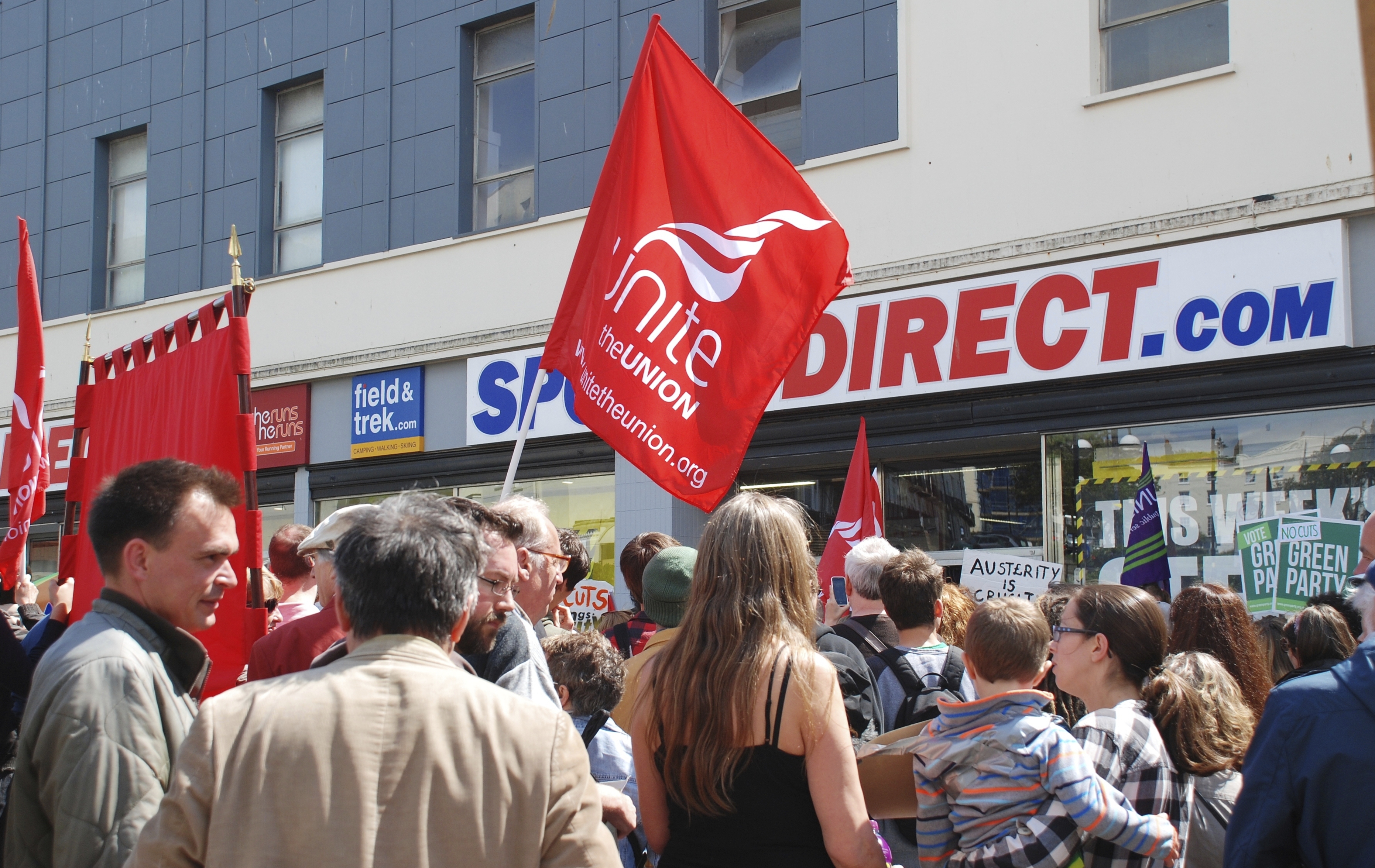 People protest against zero hour employment contracts outside a branch of Sports Direct in Hastings.
