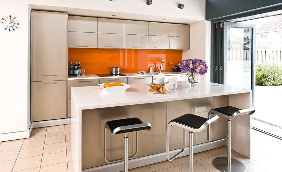 gloss orange wall in a family kitchen