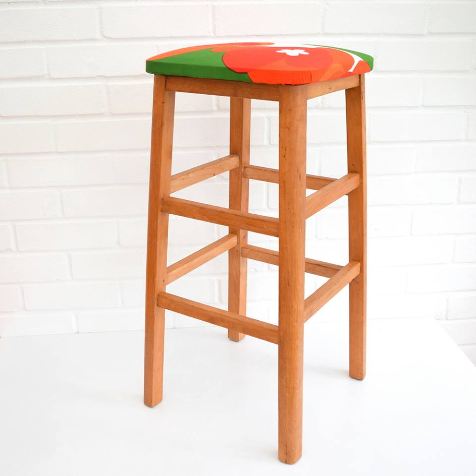 Vintage stool covered in fabric