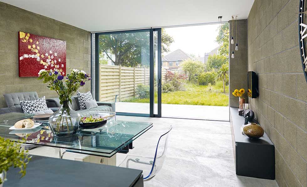 modern extension with an exposed brick wall