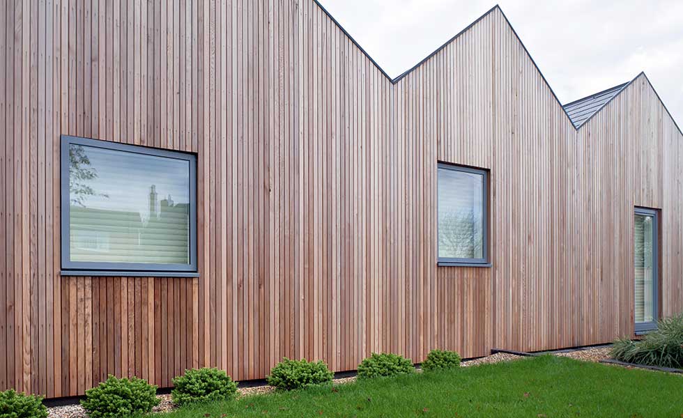 fabric first timber clad house by Mole Architects