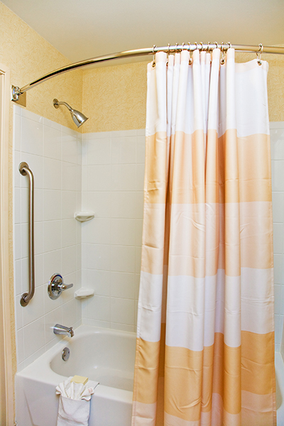 Shower with open curtain.