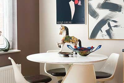 Mid-century style dining table in a living room