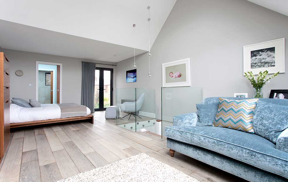 loft with bed and living area