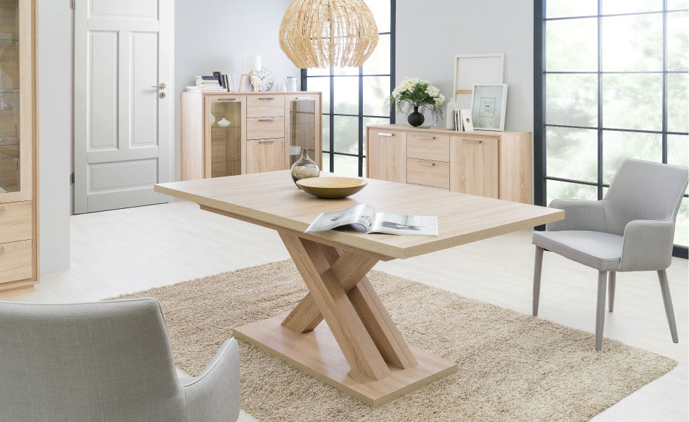 The Deluca Dining table from furnitureinfashion.net, extends from 160cm to 200cm. The central leg makes it easy to seat more guests without the limitations of corner legs. From £399.95
