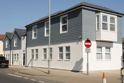 Weatherboard cladding range in Colonial Blue and White used for South Hants Property Service development