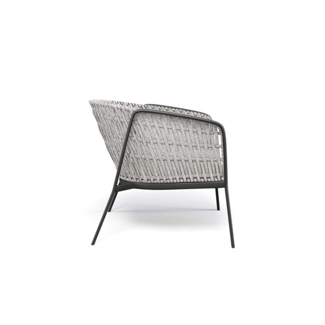 The Carousel lounge chair with flat weave is designed to combine contemporary design and high performance, making it an ideal solution for high-quality outdoor furniture projects. The trestle structure in aluminum tubing ensures lightness, robustness, and durability over time, making it perfect for outdoor use. The seat, made of die-cast aluminum alloy, is shaped to achieve an essential and elegant form and is fixed to the structure via TIG structural welding, a technology that ensures maximum resistance, long-term reliability, and a high aesthetic standard. The steel backrest structure supports the flat weave of high-quality synthetic rope, a distinctive element that enhances the armchair's design. For optimal comfort, the Carousel lounge chair can be completed with a padded cushion covered in a wide range of outdoor fabrics, designed to resist weather conditions. All materials used offer high resistance, color stability, and water repellency, making the product particularly suitable for marine environments, outdoor spaces, and extreme weather conditions.
