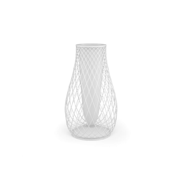 The Heaven low vase, designed by Jean-Marie Massaud, is an ode to lightness and timeless elegance. Its presence adds a refined and harmonious touch, capable of stylishly enhancing every environment, from domestic living rooms to the most refined contract spaces. The base, made with a delicate lattice of hot-galvanized steel rods, weaves lines and voids with lightness, creating a modern and captivating silhouette. The polyethylene body adds contemporaneity and versatility, making the vase perfect for discreetly and elegantly showcasing plants or flowers. Heaven transforms every space into a cozy and sophisticated place, where design and lightness merge in harmony, becoming the distinctive detail that enriches the environment.