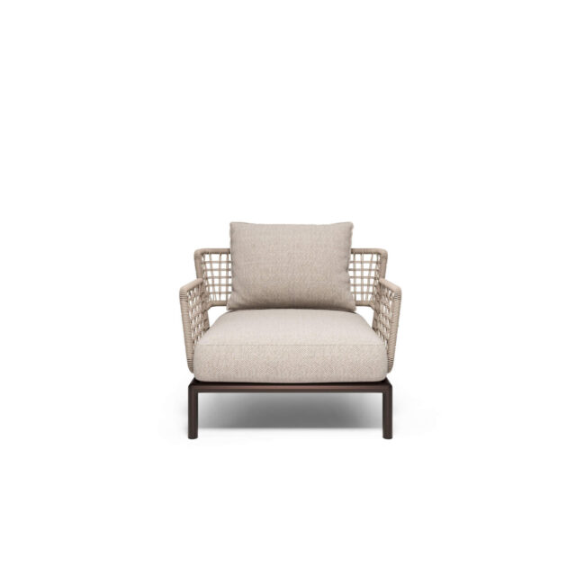 The Saint Martin 1-seater sofa, designed by Marco Acerbis, combines flexibility, elegance, and comfort in a perfect balance. Its strength lies in its versatility: the steel base, a symbol of the EMU DNA, is repeated in all the elements of the collection, allowing for always new and harmonious configurations. The perimeter structure, covered with a refined wicker rope weave, gives the sofa a touch of great elegance and visual lightness. Comfortable padded cushions for seating and backrest, available in various fabrics, complete the design, inviting relaxation and offering immediate comfort. Saint Martin transforms every outdoor space into a refined, versatile, and welcoming environment, where style, functionality, and harmony merge in perfect harmony, making every outdoor moment an experience of pure pleasure.