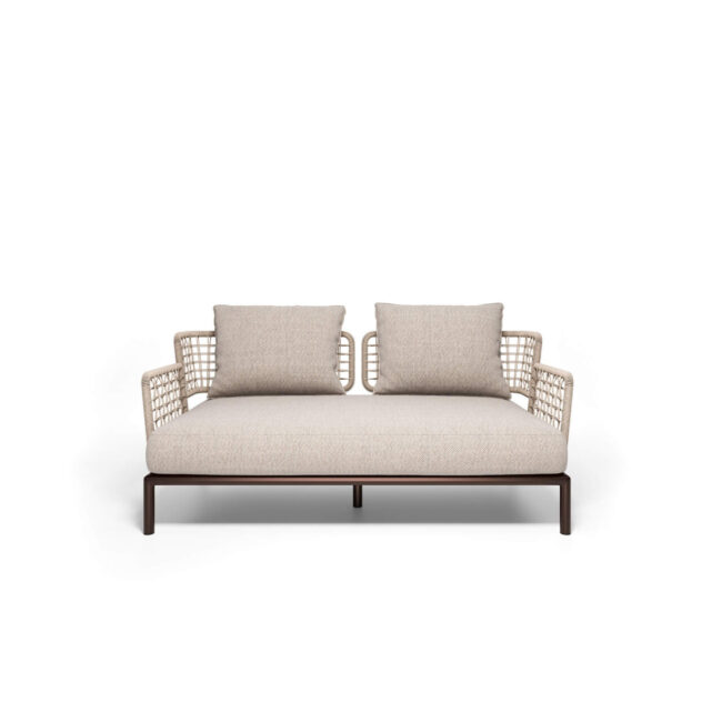 The Saint Martin 2-seater sofa, designed by Marco Acerbis, is the perfect expression of flexibility, elegance, and comfort. Its strength lies in its versatility: the steel base, an emblem of the EMU DNA, is repeated in all the elements of the collection, allowing for always new and harmonious combinations. The perimeter structure, wrapped in a refined wicker rope weave, gives visual lightness and a touch of great elegance, while the comfortable padded cushions for seating and backrest, available in various fabrics, invite relaxation and offer immediate comfort. Saint Martin transforms every outdoor space into a refined, versatile, and welcoming environment, where design, functionality, and harmony meet, making every outdoor moment an experience of pure pleasure and style.