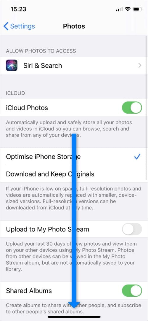 Photos settings app with scroll arrow in iPhone settings