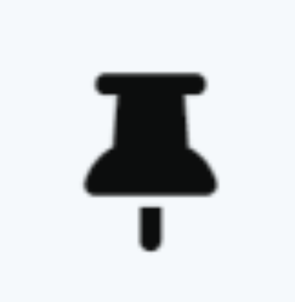 A black push pin Description automatically generated