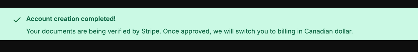 Green banner stating that account creation is complete and Stripe is verifying your documents