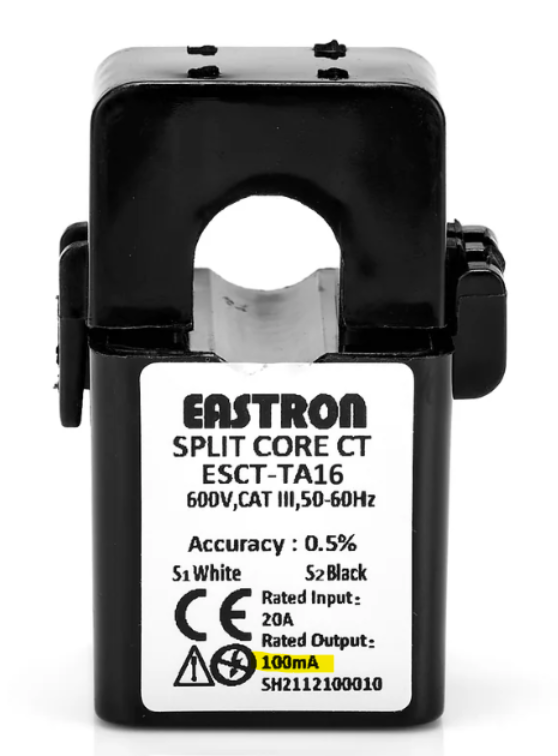 A black and white device with a white label 
Description automatically generated