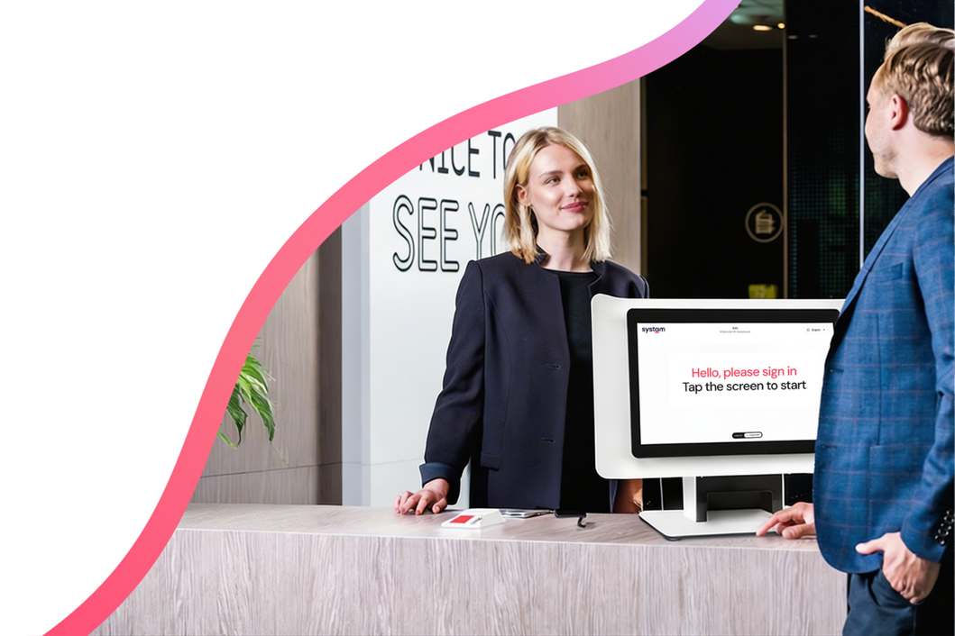 Systam Table X self-service kiosk at a reception desk