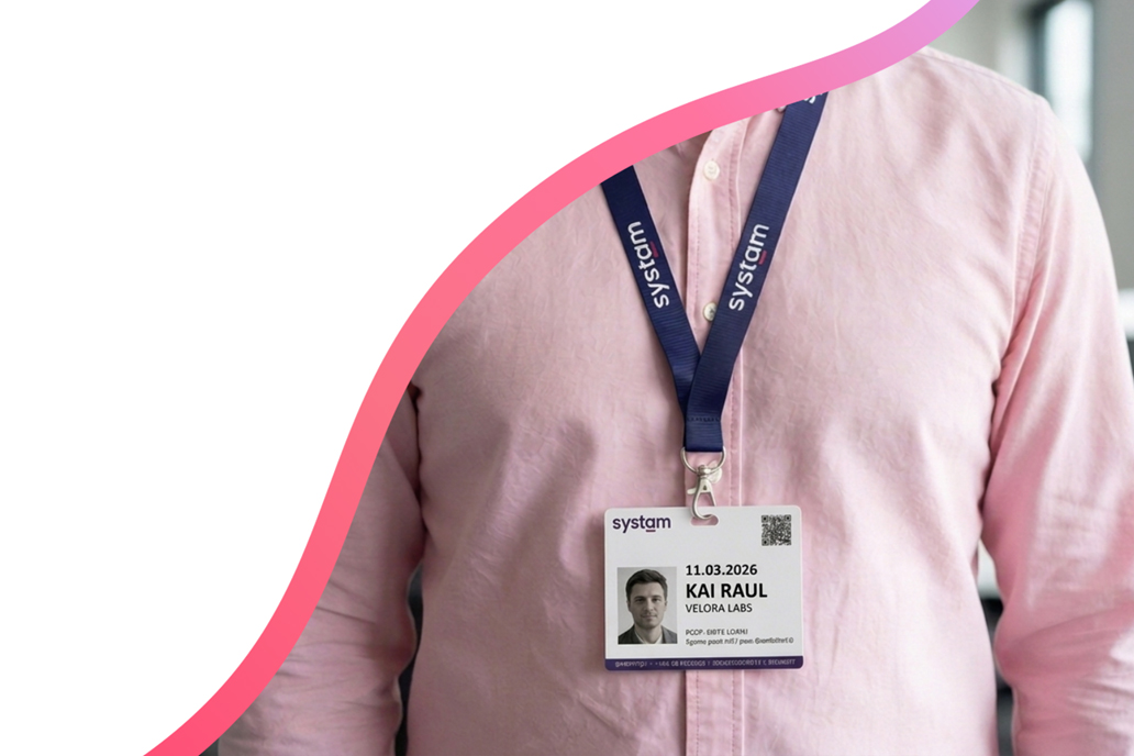 A visitor badge on a lanyard
