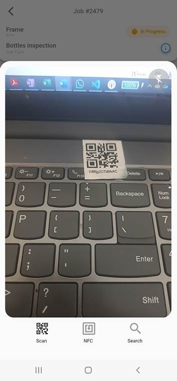 A qr code on a keyboard

AI-generated content may be incorrect.