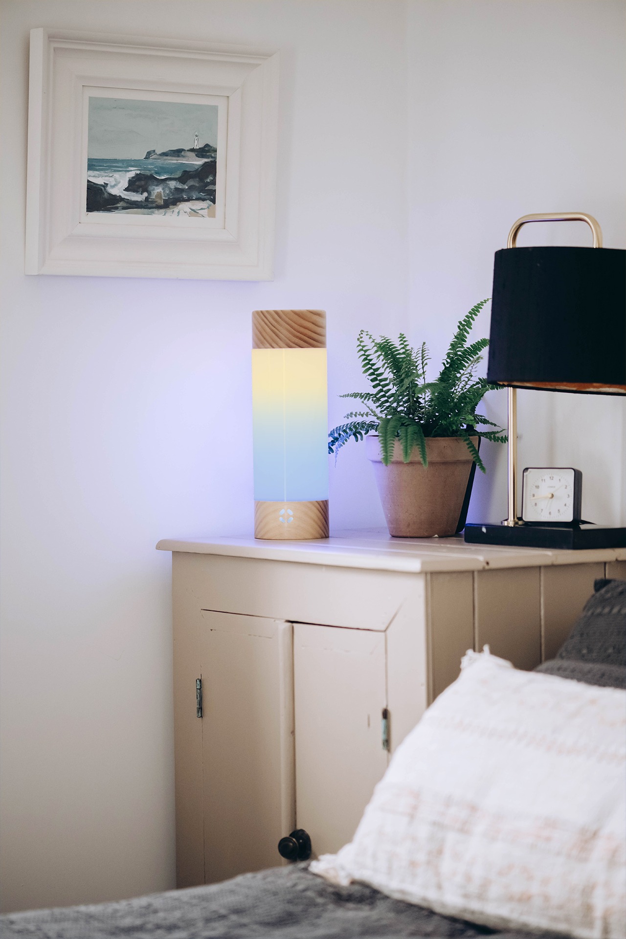 Tide.lamp on a bedside table