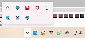 Windows 11 Taskbar settings with Other system tray icons expanded, showing an example CorelDRAW Compatibility icon entry that can be turned on.