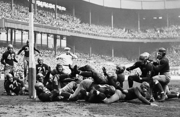 Washington Redskins back Cliff Battles (20) scores against the New York Giants in 1937 game played on Dec. 5, 1937 at the Polo Grounds. Redskins, with Battles and Sammy Baugh, smashed Giants, 49-14, to win eastern division champions of the NFL. (AP Photo)