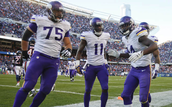 Nov 1, 2015; Chicago, IL, USA; Minnesota Vikings wide receiver Stefon Diggs (14) celebrates with teammates after scoring a touchdown against the Chicago Bears during the fourth quarter at Soldier Field. The Vikings won 23-20. Mandatory Credit: Kamil Krzaczynski-USA TODAY Sports