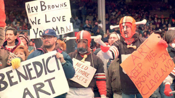 CLEVELAND, OH - NOVEMBER 5: Cleveland Browns fans, some dressed in the team's "Dog Pound" attire, show both their love for the team and their displeasure with Browns owner Art Modell before Cleveland's 05 November game at Municipal Stadium against the Houston Oilers. Reportedly, it will be announced 06 November that Modell plans to move the team to Baltimore, Maryland at the end of the season. The Houston Oilers defeated the Browns 37-10. AFP PHOTO (Photo credit should read KIMBERLY BARTH/AFP/Getty Images)