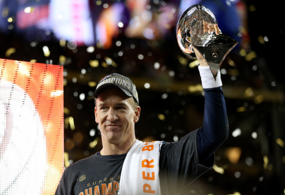 SANTA CLARA, CA - FEBRUARY 07: Peyton Manning #18 of the Denver Broncos celebrates with the Vince Lombardi Trophy after Super Bowl 50 at Levi's Stadium on February 7, 2016 in Santa Clara, California. The Broncos defeated the Panthers 24-10. (Photo by Patrick Smith/Getty Images)