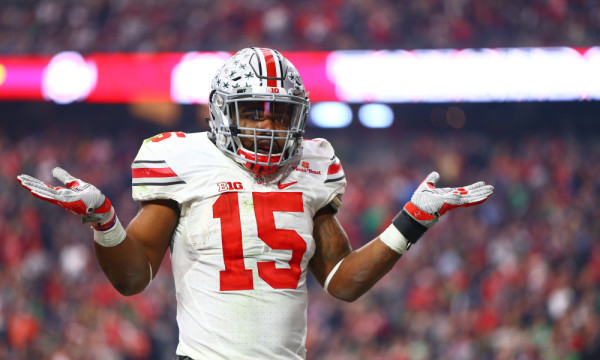 Jan 1, 2016; Glendale, AZ, USA; Ohio State Buckeyes running back Ezekiel Elliott (15) reacts in the end zone as he celebrates a second half against the Notre Dame Fighting Irish during the 2016 Fiesta Bowl at University of Phoenix Stadium. The Buckeyes defeated the Fighting Irish 44-28. Mandatory Credit: Mark J. Rebilas-USA TODAY Sports ORG XMIT: USATSI-233950 ORIG FILE ID: 20160101_mjr_su5_055.JPG