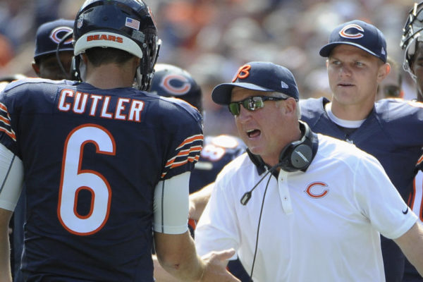 Chicago Bears head coach John Fox celebrates a touchdown with quarterback Jay Cutler (6) during the first half of an NFL football game against the Arizona Cardinals, Sunday, Sept. 20, 2015, in Chicago. (AP Photo/David Banks)