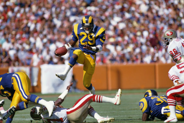 Sep 14, 1986; Anaheim, CA, USA; FILE PHOTO; Los Angeles Rams running back Eric Dickerson (29) carries the ball against the San Francisco 49ers at Anaheim Stadium. Mandatory Credit: Peter Brouillet-USA TODAY Sports