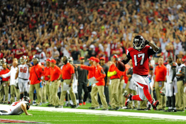 Devin Hester, shown returning a punt for a touchdown in 2014, has more combined return touchdowns (14 on punts, five on kickoffs) than anyone else in NFL history. Photo: Scott Cunningham/Getty Images