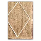 Braided Rug Made Using Natural Jute In Natural And Ivory Colors.